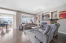 639 Copperpond Circle Se, Calgary, AB  - Indoor Photo Showing Living Room With Fireplace 