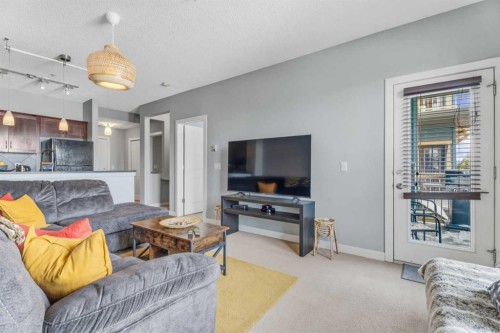320-201 Sunset Drive, Cochrane, AB - Indoor Photo Showing Living Room
