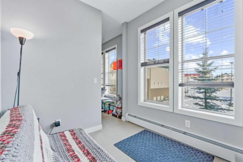 320-201 Sunset Drive, Cochrane, AB - Indoor Photo Showing Bedroom