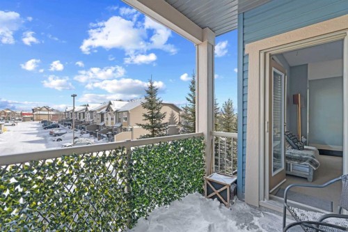 320-201 Sunset Drive, Cochrane, AB - Outdoor With Balcony
