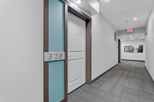 320-201 Sunset Drive, Cochrane, AB - Indoor Photo Showing Other Room