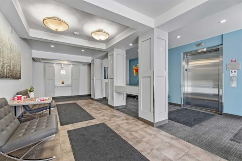 320-201 Sunset Drive, Cochrane, AB - Indoor Photo Showing Other Room