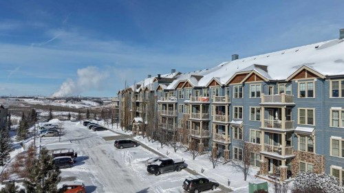 320-201 Sunset Drive, Cochrane, AB - Outdoor With Balcony