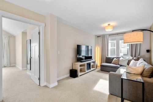 346 Cooperstown Common Sw, Airdrie, AB - Indoor Photo Showing Living Room