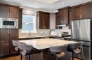 346 Cooperstown Common Sw, Airdrie, AB  - Indoor Photo Showing Kitchen With Upgraded Kitchen 