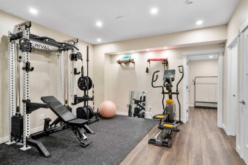 346 Cooperstown Common Sw, Airdrie, AB - Indoor Photo Showing Gym Room