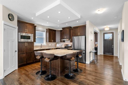 346 Cooperstown Common Sw, Airdrie, AB - Indoor Photo Showing Kitchen With Upgraded Kitchen