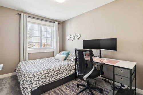 124 Cascades Pass, Chestermere, AB - Indoor Photo Showing Bedroom