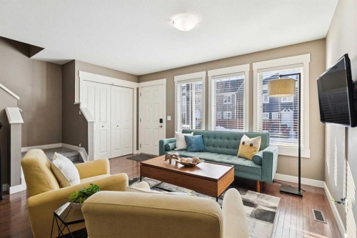 124 Cascades Pass, Chestermere, AB - Indoor Photo Showing Living Room