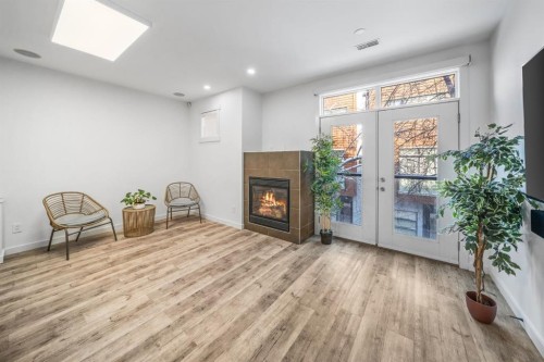 156 9 Street Ne, Calgary, AB - Indoor With Fireplace
