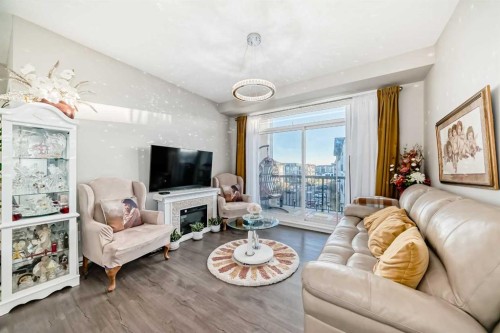 405-10 Walgrove Se, Calgary, AB - Indoor Photo Showing Living Room With Fireplace