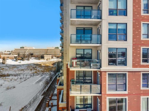 619-8710 Horton Road Sw, Calgary, AB - Outdoor With Balcony With Facade