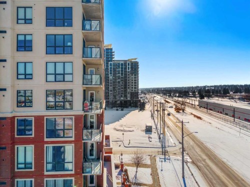 619-8710 Horton Road Sw, Calgary, AB - Outdoor With Balcony With Facade