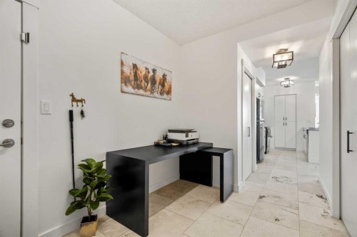 619-8710 Horton Road Sw, Calgary, AB - Indoor Photo Showing Other Room