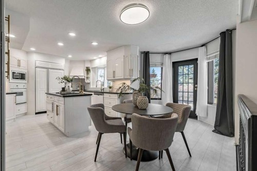 162 Woodbend Way, Okotoks, AB - Indoor Photo Showing Dining Room