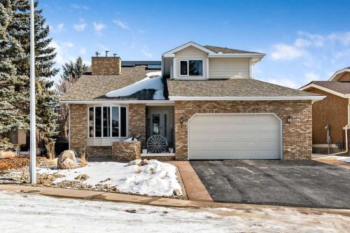 162 Woodbend Way  Okotoks, AB T1S 1M1