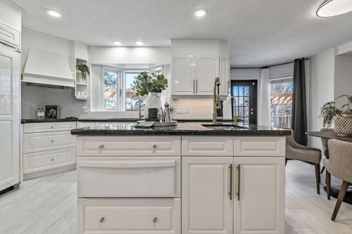 162 Woodbend Way, Okotoks, AB - Indoor Photo Showing Kitchen