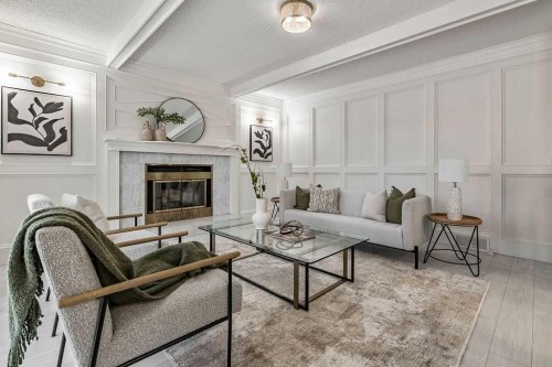 162 Woodbend Way, Okotoks, AB - Indoor Photo Showing Living Room With Fireplace