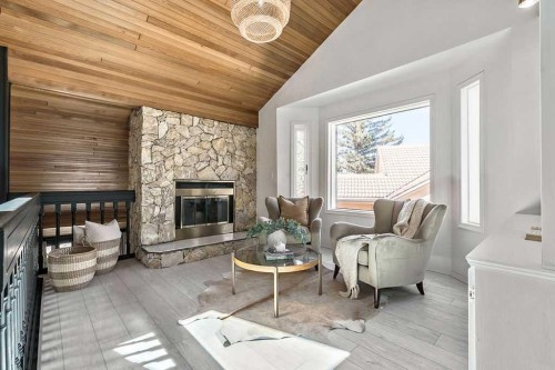 162 Woodbend Way, Okotoks, AB - Indoor Photo Showing Living Room With Fireplace