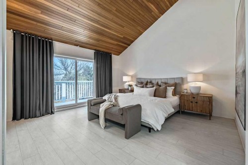 162 Woodbend Way, Okotoks, AB - Indoor Photo Showing Bedroom