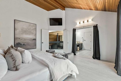 162 Woodbend Way, Okotoks, AB - Indoor Photo Showing Bedroom