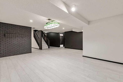 162 Woodbend Way, Okotoks, AB - Indoor Photo Showing Other Room