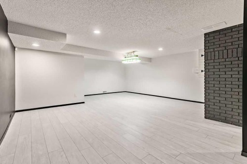 162 Woodbend Way, Okotoks, AB - Indoor Photo Showing Other Room