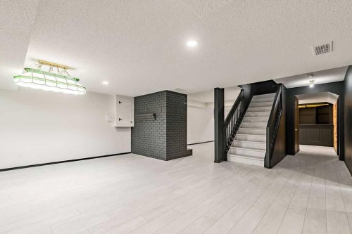 162 Woodbend Way, Okotoks, AB - Indoor Photo Showing Other Room