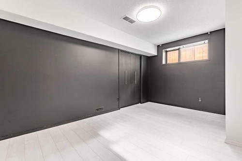 162 Woodbend Way, Okotoks, AB - Indoor Photo Showing Other Room