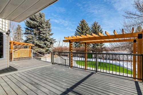 162 Woodbend Way, Okotoks, AB - Outdoor With Deck Patio Veranda