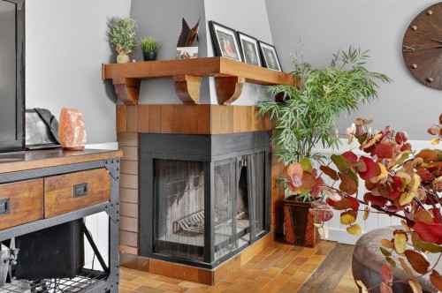 139 Hodson Crescent, Okotoks, AB - Indoor With Fireplace