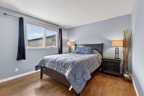 139 Hodson Crescent, Okotoks, AB - Indoor Photo Showing Bedroom