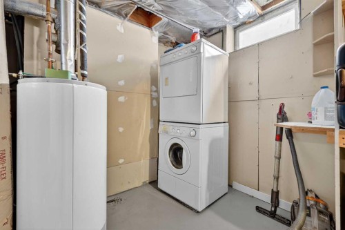 139 Hodson Crescent, Okotoks, AB - Indoor Photo Showing Laundry Room