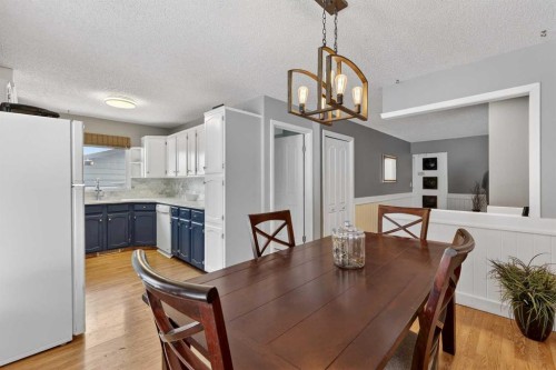 139 Hodson Crescent, Okotoks, AB - Indoor Photo Showing Dining Room