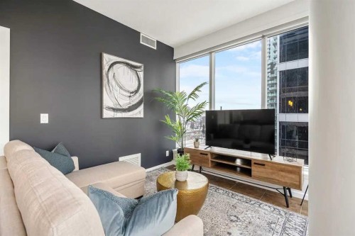 802-211 13 Avenue Se, Calgary, AB - Indoor Photo Showing Living Room
