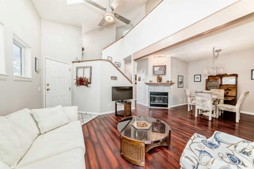 1906 Patterson View Sw, Calgary, AB - Indoor Photo Showing Living Room With Fireplace