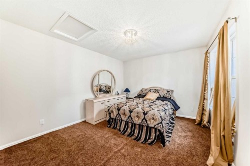 1906 Patterson View Sw, Calgary, AB - Indoor Photo Showing Bedroom