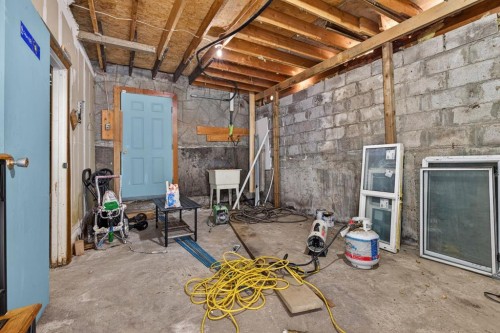 255 Rundleridge Drive Ne, Calgary, AB - Indoor Photo Showing Basement