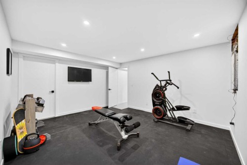 7103 Bow Crescent Nw, Calgary, AB - Indoor Photo Showing Gym Room