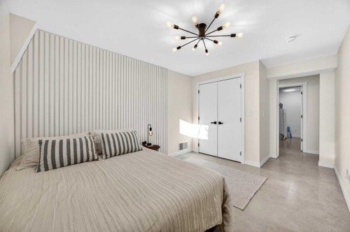 7103 Bow Crescent Nw, Calgary, AB - Indoor Photo Showing Bedroom