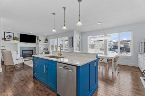 5 Cimarron Springs Circle, Okotoks, AB - Indoor Photo Showing Kitchen With Fireplace With Double Sink With Upgraded Kitchen