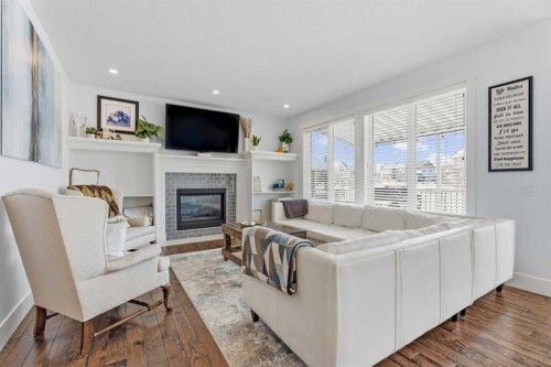 5 Cimarron Springs Circle, Okotoks, AB - Indoor Photo Showing Living Room With Fireplace