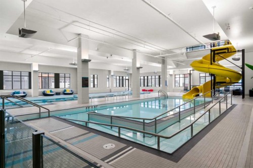 607-11 Mahogany Circle Se, Calgary, AB - Indoor Photo Showing Other Room With In Ground Pool