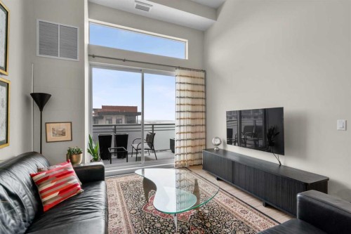 607-11 Mahogany Circle Se, Calgary, AB - Indoor Photo Showing Living Room