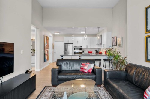607-11 Mahogany Circle Se, Calgary, AB - Indoor Photo Showing Living Room
