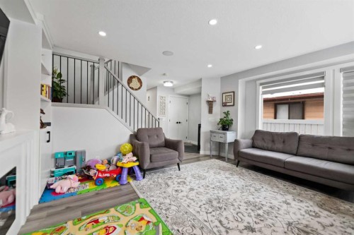 313 Falwood Way Ne, Calgary, AB - Indoor Photo Showing Living Room
