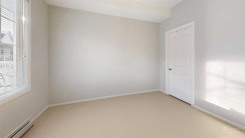 107-8 Prestwick Pond Terrace Se, Calgary, AB - Indoor Photo Showing Other Room