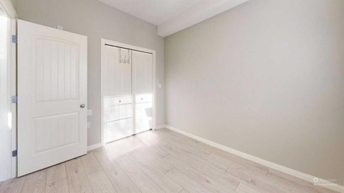 107-8 Prestwick Pond Terrace Se, Calgary, AB - Indoor Photo Showing Other Room