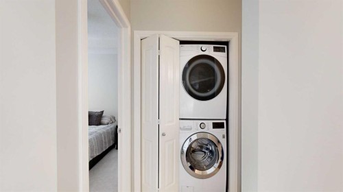 107-8 Prestwick Pond Terrace Se, Calgary, AB - Indoor Photo Showing Laundry Room