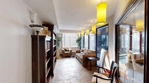107-8 Prestwick Pond Terrace Se, Calgary, AB - Indoor Photo Showing Other Room